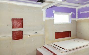 drywall tape bathroom interior with drywall completely installed